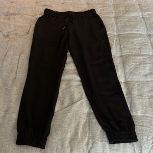 Ann Taylor black drawstring pants, size small tall. Dressy jogger style.